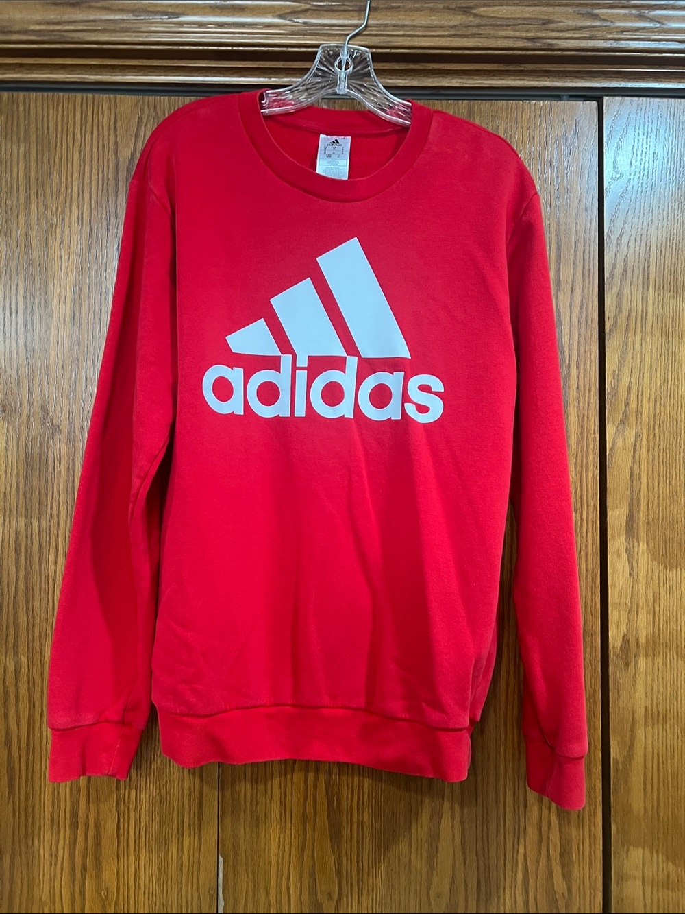 Adidas red Essentials fleece big logo.  IJ8900